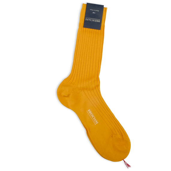 Socken in strahlendem Orange mit Rippen von Calzificio M Bresciani